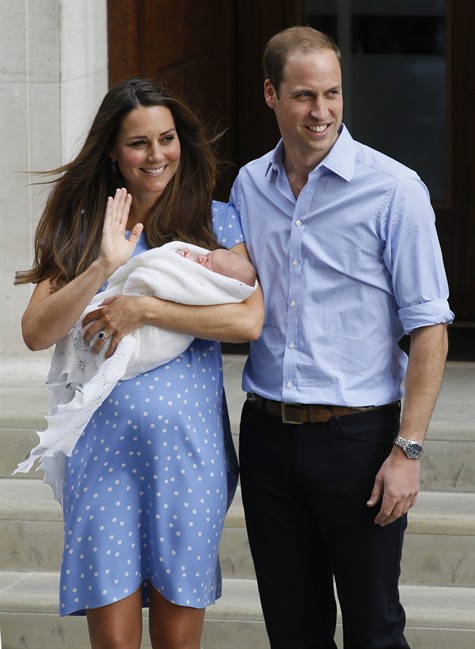 Prince William and Kate show off their firstborn.