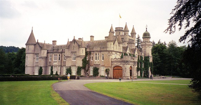 FILE - This Aug. 2002 file photo shows Balmoral Castle, near Ballater in the Scottish Highlands. 