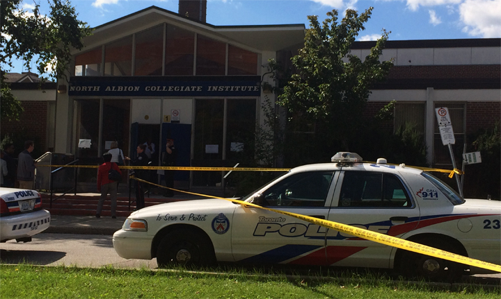 Police investigate after a young man was stabbed at a north Etobicoke high school on September 23.
