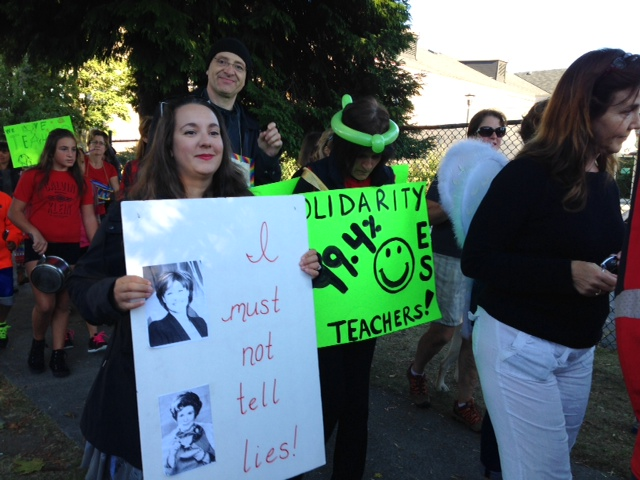 Students and parents rallied in support of teachers Friday morning.