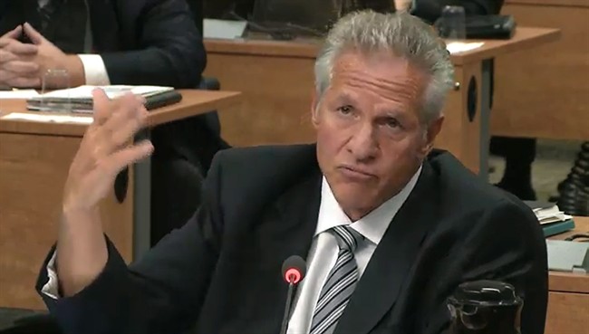 Construction magnate Tony Accurso is seen on an image taken off a television monitor at the Charbonneau inquiry looking into corruption in the Quebec construction industry Friday, September 5, 2014 in Montreal.