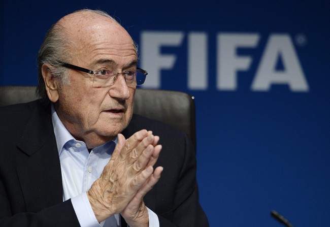 FIFA president Joseph Sepp Blatter listens to journalist's questions at a press conference following a FIFA Executive Committee meeting, on Friday, Sept.26, 2014, at the FIFA headquarters in Zurich, Switzerland.
