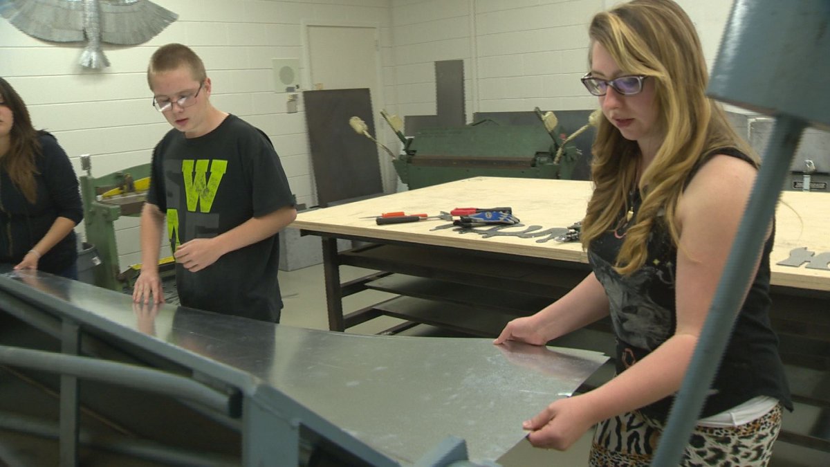Traditional classroom lessons are being used at Campus Regina Public to build things like heating ducts.