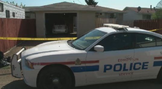 Edmonton police investigate a violent break and enter in north Edmonton, June 3, 2014.