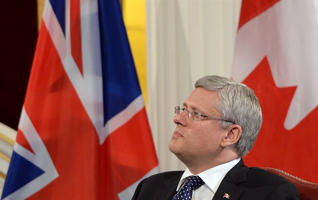 Prime Minister Stephen Harper takes part in an economic question and answer session at Mansion House in London, England on Wednesday Sept. 3, 2014. THE CANADIAN PRESS/Sean Kilpatrick.