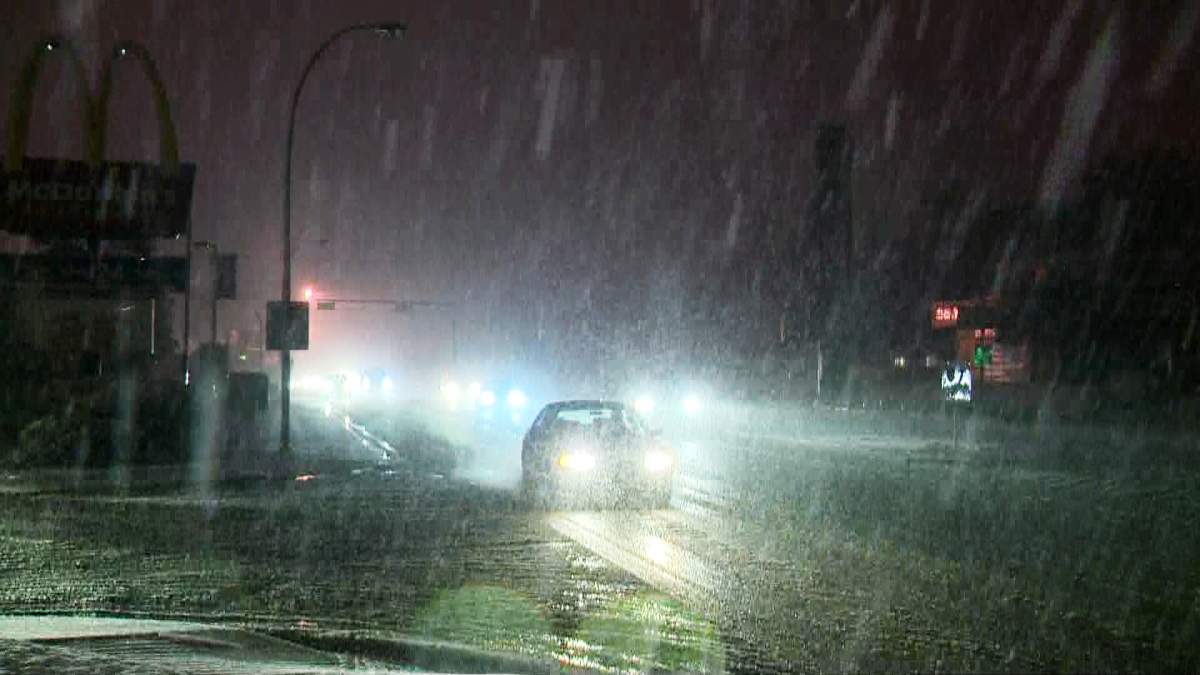 Snowfall in Calgary makes for a slick and slushy drive to work on Wednesday, September 10th, 2014 – even causing power outages.