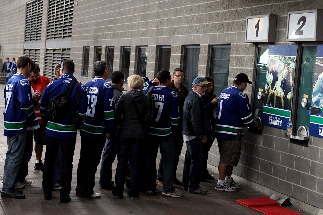 Vancouver Canucks fans line up to purchase preseason tickets.