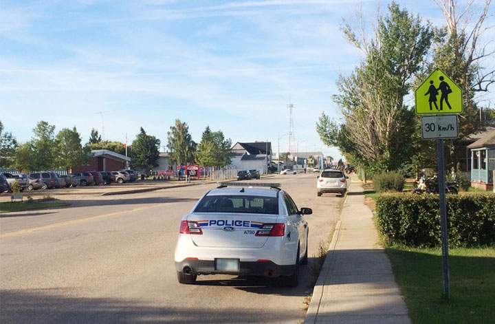 A member of the RCMP arrested two wanted suspects during a traffic blitz on Thursday in Watrous, Sask.