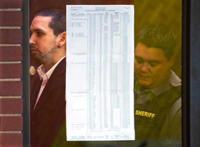 Gordon Frank Nickerson is led from provincial court in Kentville, N.S on Sept. 4, 2014. 