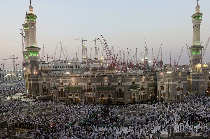 Muslim pilgrims pray outside the Grand Mosque, a day before Muslim's annual pilgrimage, known as the Hajj, in the Muslim holy city of Mecca, Saudi Arabia, Wednesday, Oct. 1, 2014.
