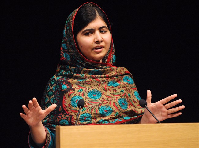 Pakistani schoolgirl Malala Yousafzai speaks during a media conference at the Library of Birmingham, in Birmingham, England, Oct.10, 2014. 