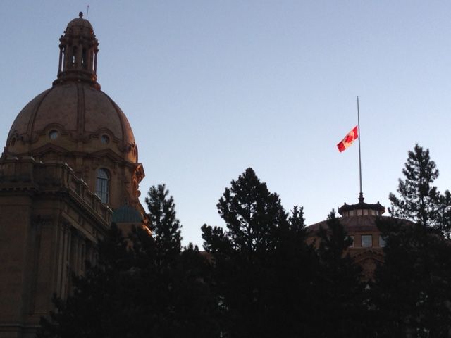 Flags at Alberta Legislature lowered on October 23, 2014.