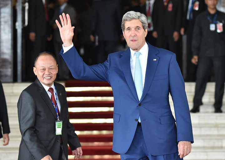 US Secretary of State John Kerry (R) attends the inaugural ceremony of new Indonesian President Joko Widodo at the House of Representative in Jakarta on October 20, 2014.  Widodo, 53, popularly known by his nickname Jokowi, Indonesia's first leader without deep roots in the era of dictator Suharto, is sworn in as president but faces huge challenges to enact a bold reform agenda. 