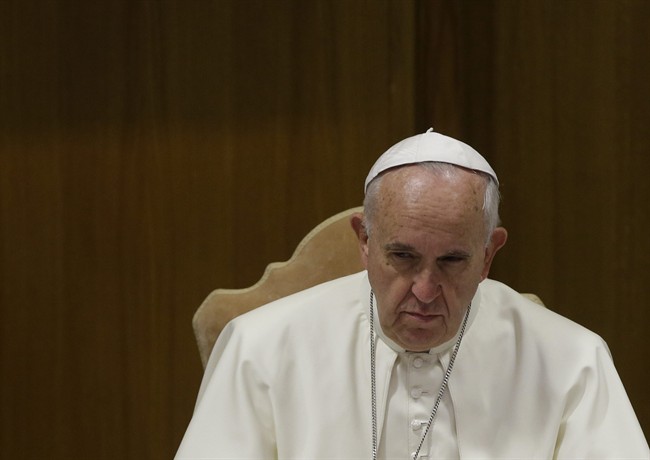 Pope Francis attends the morning session of a two-week synod on family issues at the Vatican, Saturday, Oct. 18, 2014. 