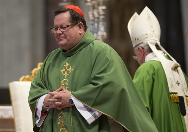 Cardinal Gerald Cyprien Lacroix, Archbishop of Quebec leaves after he delivering a speech during a Mass of Thanksgiving for the canonization of two Canadian saints, St. Francis de Laval and St. Mary of the Incarnation, celebrated by Pope Francis, in St. Peter's Basilica, at the Vatican, Sunday, Oct. 12, 2014.