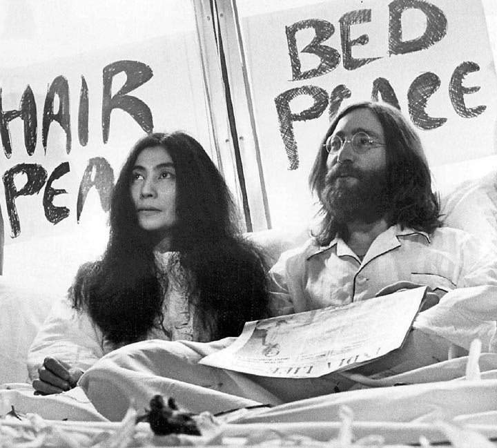 John Lennon and his wife Yoko Ono begin a seven day bed-in for peace in a Montreal hotel May 27, 1969.