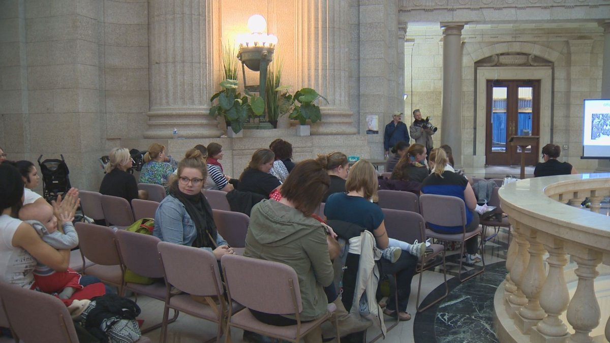 A group of mom's breastfeeding at the 2014 Breastfeeding Challenge at the Manitoba Legislature building.