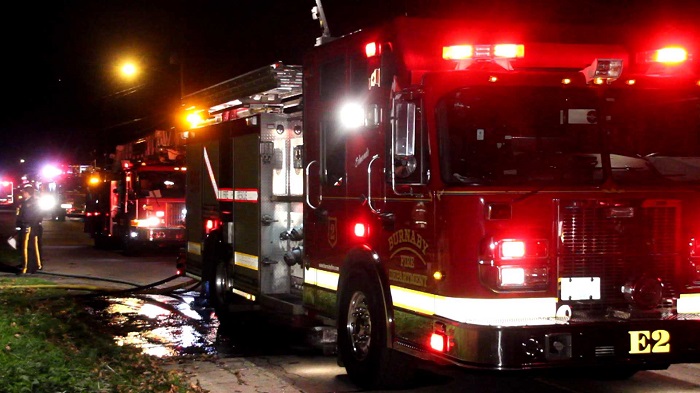 Fire crews deal with a suspicious house fire in Burnaby - image