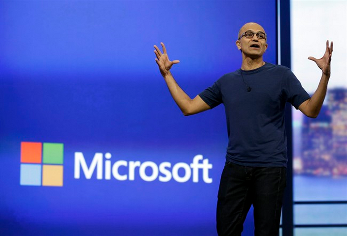 In this Tuesday, Sept. 30, 2014 file photo, Microsoft Chief Executive Officer Satya Nadella speaks to students in New Delhi. On Thursday, Oct. 9, 2014, Nadella spoke at an event for women in computing held in Phoenix, saying women don't need to ask for a raise. They should just trust the system. He was asked to give his advice to women who are uncomfortable requesting a raise. (AP Photo/Manish Swarup).