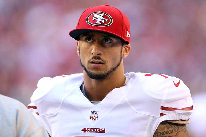 File photo: Colin Kaepernick #7 of the San Francisco 49ers looks on from the sideline against the Arizona Cardinals during a game at University of Phoenix Stadium on December 29, 2013 in Glendale, Arizona.  