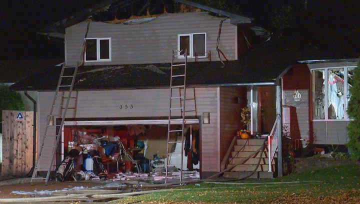 Saskatoon firefighter slightly injured while battling house blaze in Lawson Heights neighbourhood early Tuesday morning.