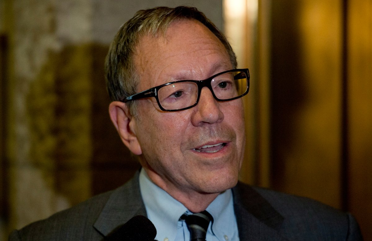 Liberal MP Irwin Cotler speaks with the media following Liberal party caucus Wednesday October 8, 2014 in Ottawa. THE CANADIAN PRESS/Adrian Wyld.