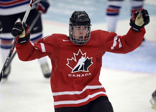 Connor McDavid celebrates his go-ahead goal against the USA during third period action at the IIHF World Junior Hockey Championships in Malmo, Sweden on Tuesday, December 31, 2013.