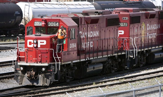 Canadian Pacific Railway locomotives move cars at a railyard in Calgary, in a May 16, 2012 photo. 