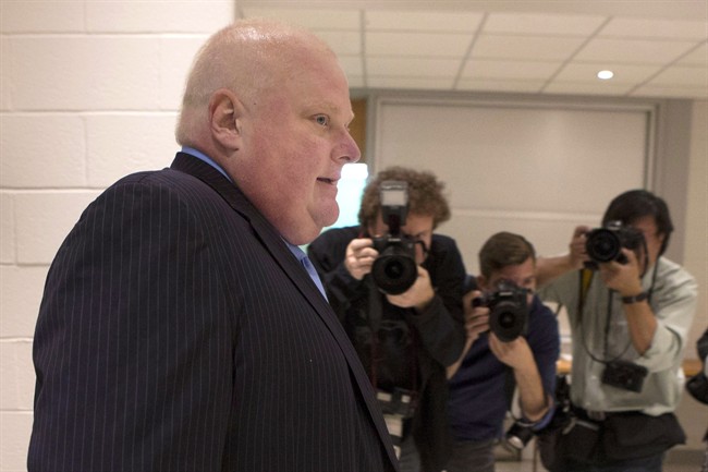 Toronto Mayor Rob Ford arrives to cast his ballot in advance voting for the Toronto Municipal Election at an Etobicoke polling station on October 14, 2014.
