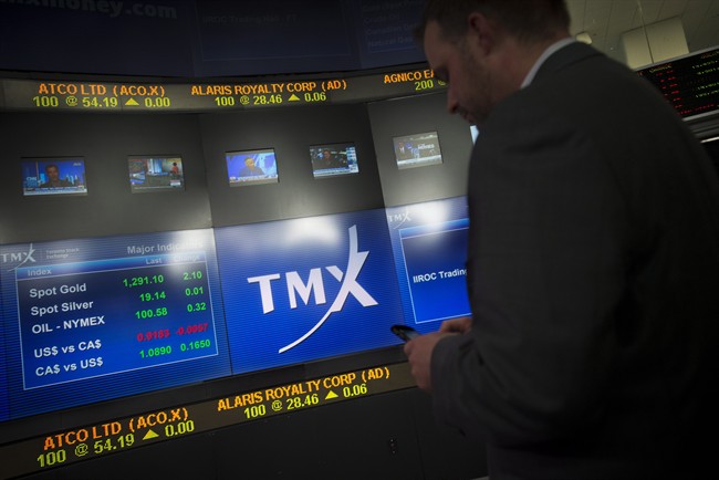 A man works in the broadcast centre at the TMX Group Ltd. in Toronto, on May 9, 2014. 