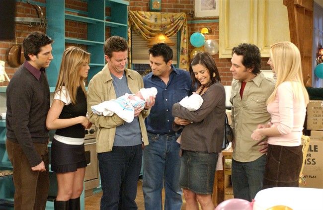 David Schwimmer, left, Jennifer Aniston, Matthew Perry, Matt LeBlanc, Courteney Cox Arquette, Paul Ruddand, and Lisa Kudrow appear in this scene from the series finale of NBC's "Friends," in this undated publicity photo. THE CANADIAN PRESS/AP, Warner Bros.