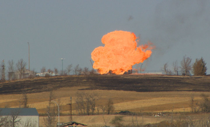 Remaining gas is burned off after explosion and fire at a gas pumping station owned by TransGas near Prud'homme, Sask., Sunday, October 12, 2014.