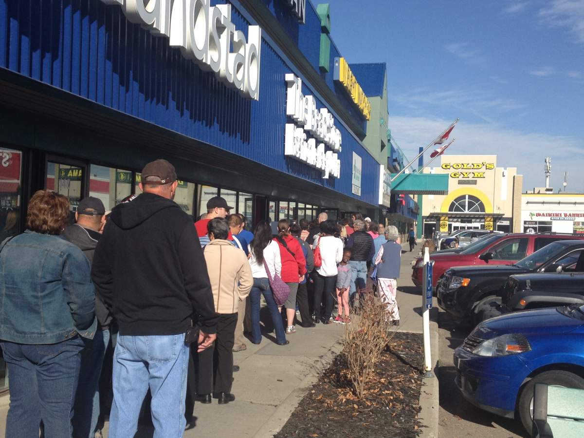 Calgarians line up for flu shots at the Northgate Mall
