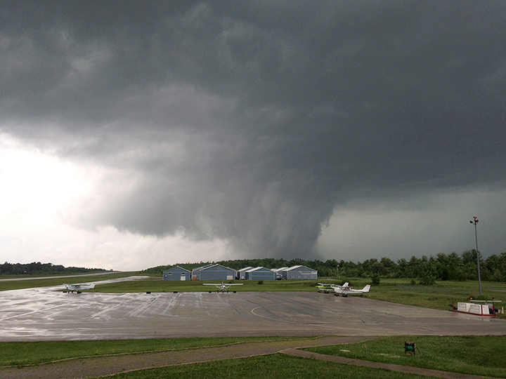 File photo - A threatening funnel cloud passes near the Owen Sound Airport in Owen Sound, Ont., on Tuesday June 17, 2014. 