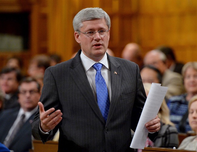 Prime Minister Stephen Harper responds to a question during question period in the House of Commons on Parliament Hill in Ottawa on Monday, Oct. 20, 2014. 
