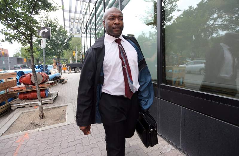 Alex Chapman leaves the Federal Court Building after testifying at an inquiry into Lori Douglas, a Court of Queen's Bench justice in Winnipeg on Monday, July 16, 2012. THE CANADIAN PRESS/Trevor Hagan.
