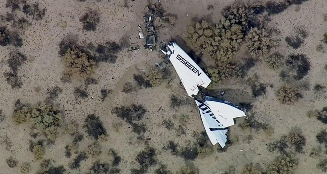 This image from video by KABC-TV Los Angeles shows wreckage of SpaceShipTwo in Southern California's Mojave Desert on Friday, Oct. 31, 2014.