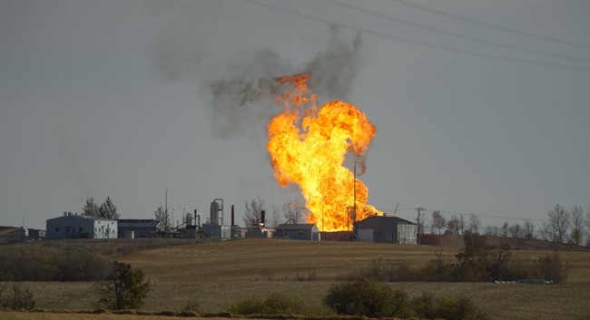 Remaining gas is burned off after explosion and fire at a gas pumping station owned by TransGas near Prud'homme, Sask., Saturday, October 11, 2014.