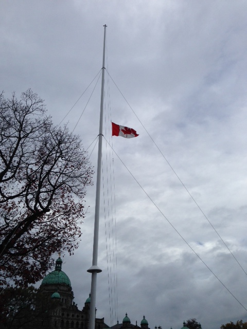 Canadian flag flying at half mast at the Legislature building in Victoria. Courtesy: Jonathan Bartlett.