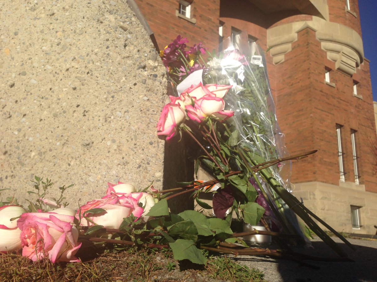 Flowers are dropped off at Mewata Armoury in Calgary in honour of soldier killed in Ottawa.