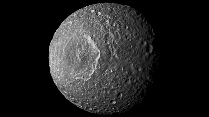 A mosaic of Mimas, one of Saturn's many moons.
