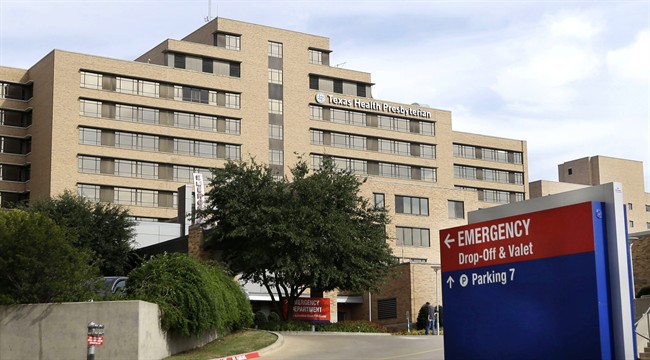  In this Oct. 8, 2014 file photo, a sign points to the entrance to the emergency room at Texas Health Presbyterian Hospital Dallas, where U.S. Ebola patient Thomas Eric Duncan was being treated, in Dallas. 