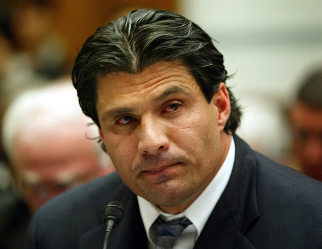 In this March 17, 2005 file photo, former Oakland Athletic and Texas Ranger baseball player Jose Canseco testifies on Capitol Hill in Washington, to examine the use of steroids in baseball. 