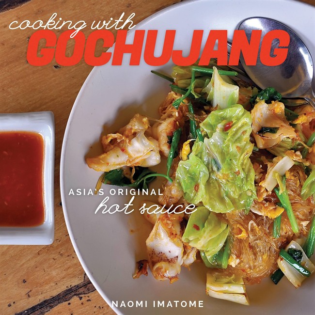 This undated image provided by Countryman Press shows the cover of “Cooking with Gochujang” by Naomi Imatome-Yun. Gochujang is an ingredient on the cusp of being discovered by the rest of America.
