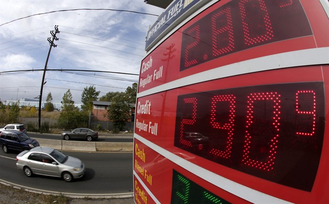 Gas prices below $3 dollars are displayed at a gas station, Wednesday, Oct. 15, 2014, in Jersey City, N.J.