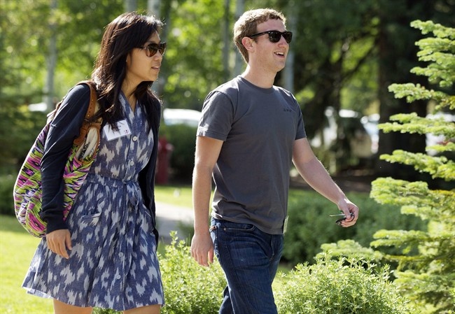 Facebook CEO Mark Zuckerberg is photographed with his wife Priscilla Chan.
