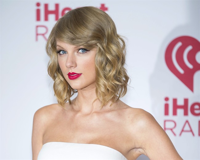 In this Sept. 19, 2014 file photo, Taylor Swift arrives at the iHeart Radio Music Festival in Las Vegas. NBC said Friday, Oct. 3.