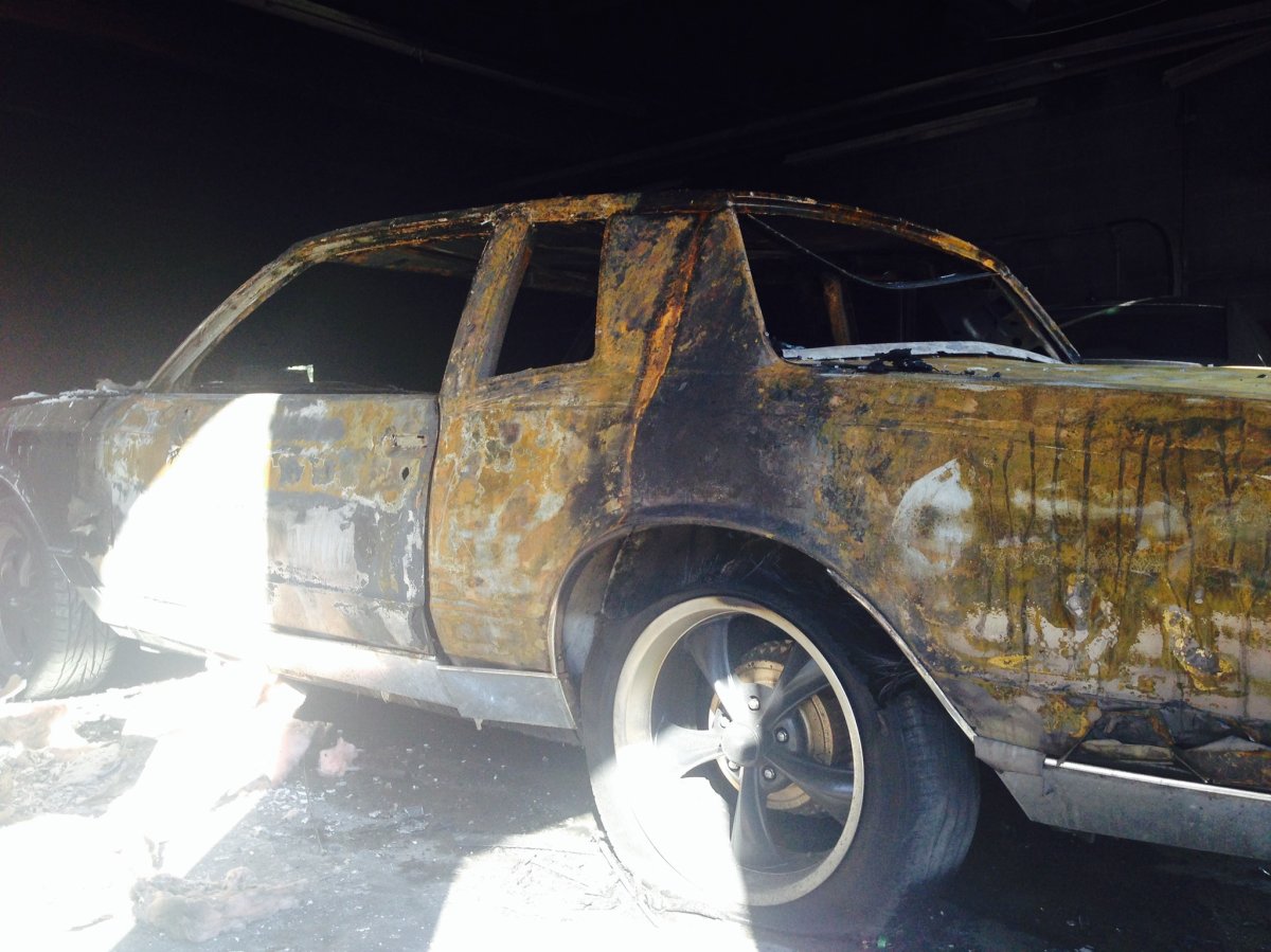 Car destroyed by early morning fire inside Boyd Autobody in Penticton.