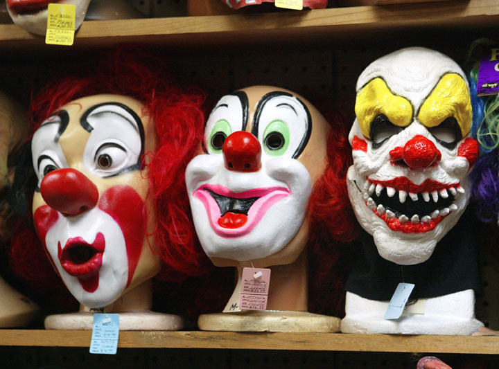 Clown masks are displayed at the Fantasy Costumes HDQ store in Chicago, Illinois. 