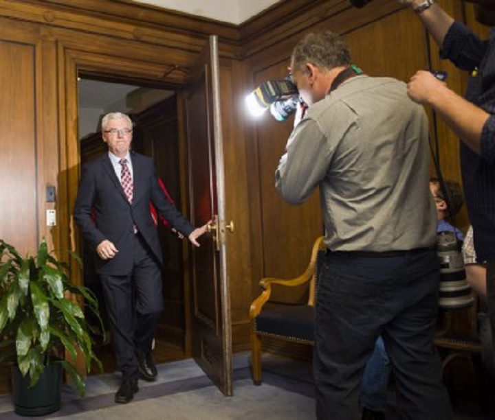 Manitoba Premier Greg Selinger enters a news conference on Tuesday, October 28, 2014.